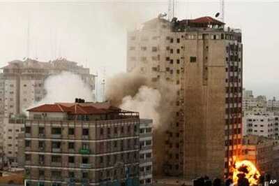 Israel, Hamas trade fire and tough truce proposals