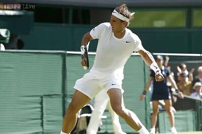 Rafael Nadal overcomes opening-set loss to advance at Wimbledon