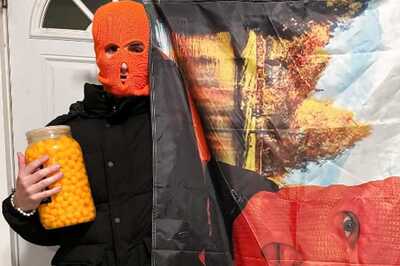 Bizarre: Hundreds Gather In NYC To Watch A Masked Man Eat A Tub Of Cheeseballs