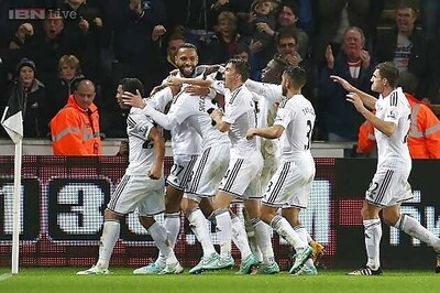 Gritty Swansea stun Arsenal 2-1 in Premier League