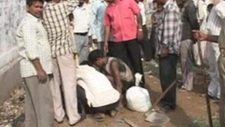 No trace of boy trapped in drain