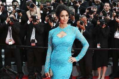 Indian actors Mallika Sherawat and Uday Chopra spotted on the Cannes red carpet at the premiere of 'Grace Of Monaco'