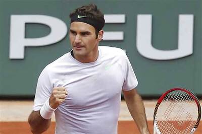 Nadal, Serena, Federer progress at Roland Garros