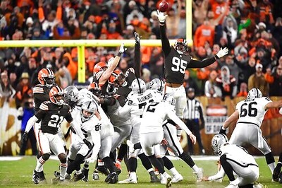 Broncos, Raiders Cling To Slim Playoff Hopes