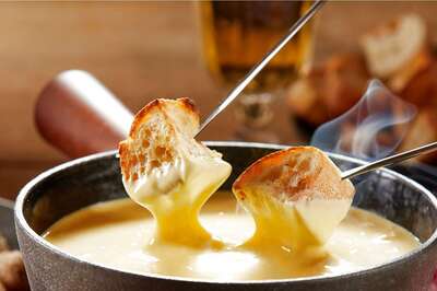 What the Fork: How Switzerland’s Fondue Became Melting Pot of Cultures, Writes Kunal Vijayakar