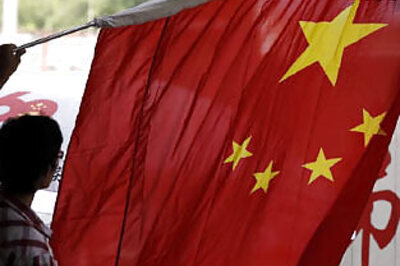 Salute passing cars, students told in China