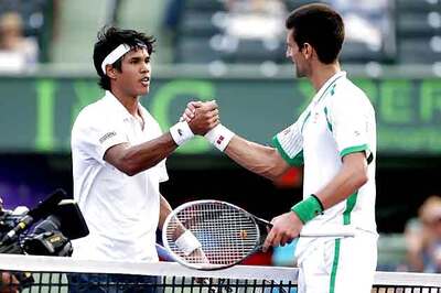 Djokovic beats Somdev, Sharapova wins at windy Miami
