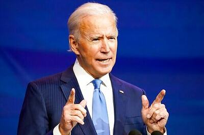 The Latest: Fauci Says Vaccinate Biden, Harris, Trump, Pence