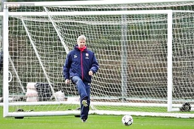 Wenger urges shattered team to respond in the right way