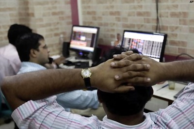 Sensex ends 13 points up; Tata Motors, techs gain