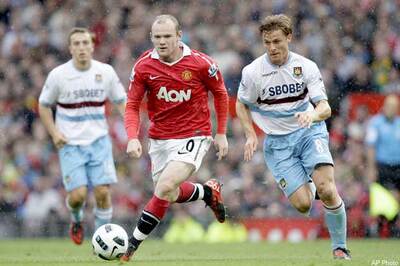 Rooney signs new 5-year contract with Man U