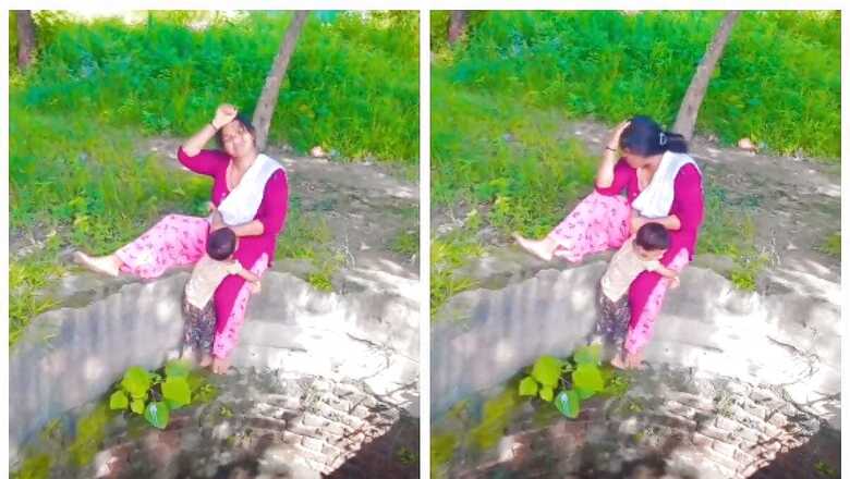 Woman Sits Near Open Well Filming Reel While Child Clings To Her Leg, Sparks Outrage Online | Video