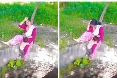 Woman Sits Near Open Well Filming Reel While Child Clings To Her Leg, Sparks Outrage Online | Video