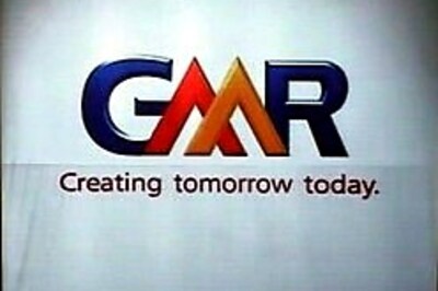 GMR makes quiet debut on bourses