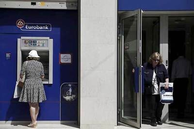 Greek banks to reopen on Monday as revamped cabinet gets to work