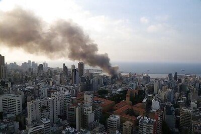 Lebanese Firefighters Douse Remains Of Beirut Port Fire
