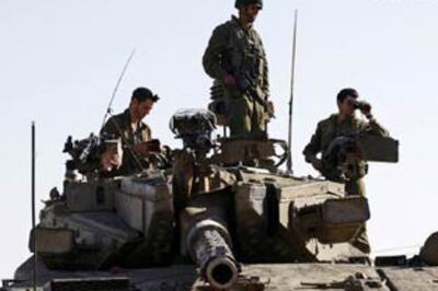 Israel kills Hamas leader, escalating offensive