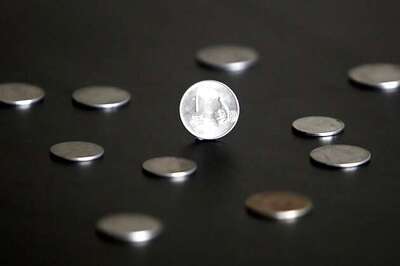 Rupee up by 8 paise against dollar in early trade