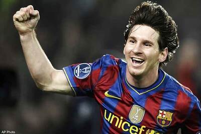 Messi nets two to push Barcelona to the verge of title