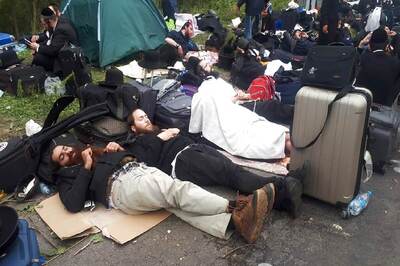 Determined Hasidic Pilgrims Collide with Coronavirus Restrictions