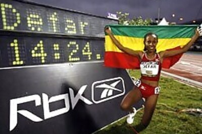 Defar breaks 5,000 m world record