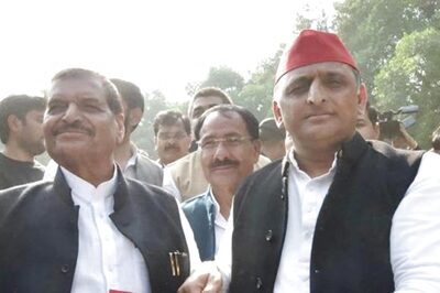 Akhilesh Yadav Presents Samajwadi Party Flag to PSPL Founder Shivpal Singh Yadav, Indicating Possible Merger of Parties