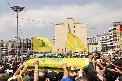 Hezbollah Rains Rockets on Israel After Strike Kills Commander, Vows to Intensify Attacks