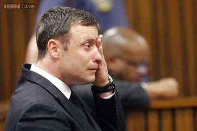 Oscar Pistorius breaks down sobbing as South African judge reads verdict