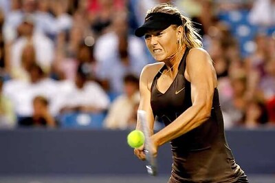 Maria Sharapova  rallies to avoid early exit at Madrid
