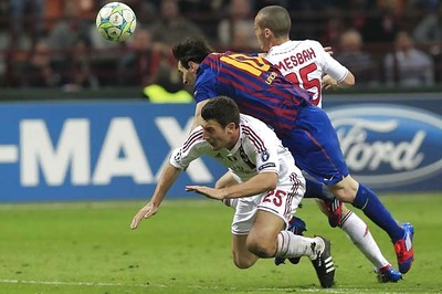 Barcelona complain to UEFA about Milan pitch