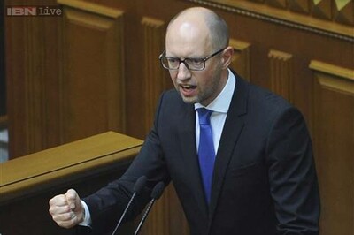 Ukraine's PM resigns amid deadly rebellion complicating MH17 probe