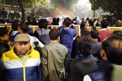 Police Use Water Cannons to Disperse Protesters at Kejriwal's Residence Seeking Action Against Delhi Rioters