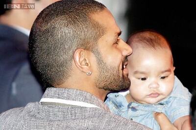 Snapshot: Aww! Shikhar Dhawan turns heads as he poses with his adorable son