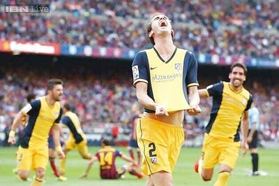 Atletico win their 10th La Liga title after holding Barcelona to a 1-1 draw