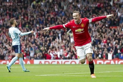 Manchester United hold on to beat West Ham after Rooney red