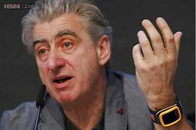 Swatch reveals plans to compete with Apple Watch, says we don't want to place a mini phone on your wrist