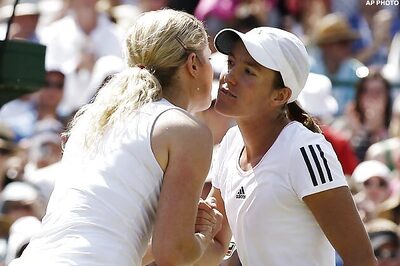 Clijsters wins Belgian contest against Henin