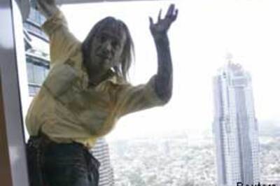 Pics: 'Spiderman' climbs Twin Towers