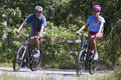 Barack Obama says he is having a 'great time' with family on vacations