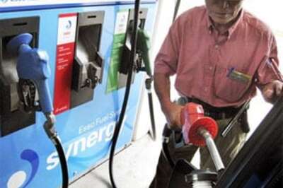 Oil jumps nearly 7 percent on supply cuts, dollar