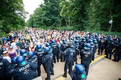 German Officials: 1,000s Of Extremists Joined Virus Protest