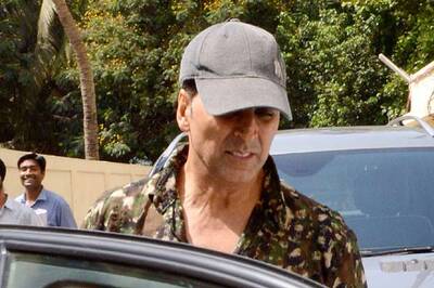 Snapshot: Family man Akshay Kumar takes wife and son on a movie date