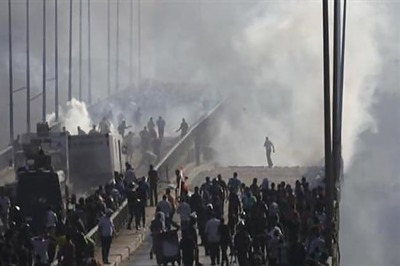 Chaos and blood in Egypt as security forces storm protest camp