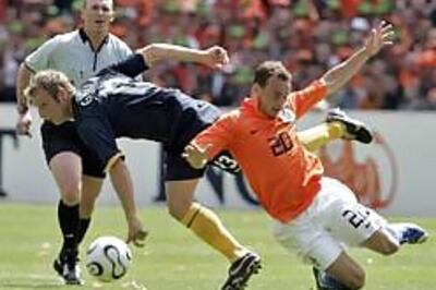 Dutch players limp off in final game