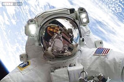 US astronauts conduct spacewalk to repair International Space Station