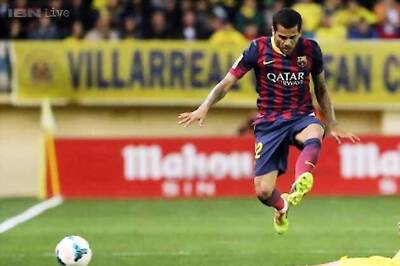 Barcelona back Dani Alves in racist banana taunt