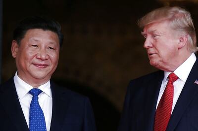Trump Drops China Bashing During Warm Xi Summit