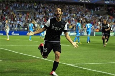 Pellegrini pats focussed Malaga players