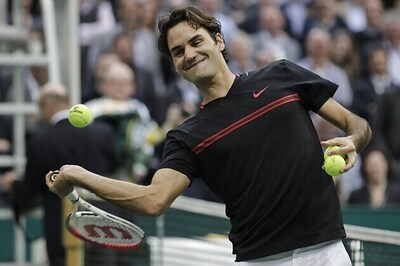 Federer tops Mahut to advance at ABN Amro