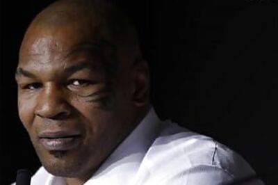 Mike Tyson arrested for punching photographer